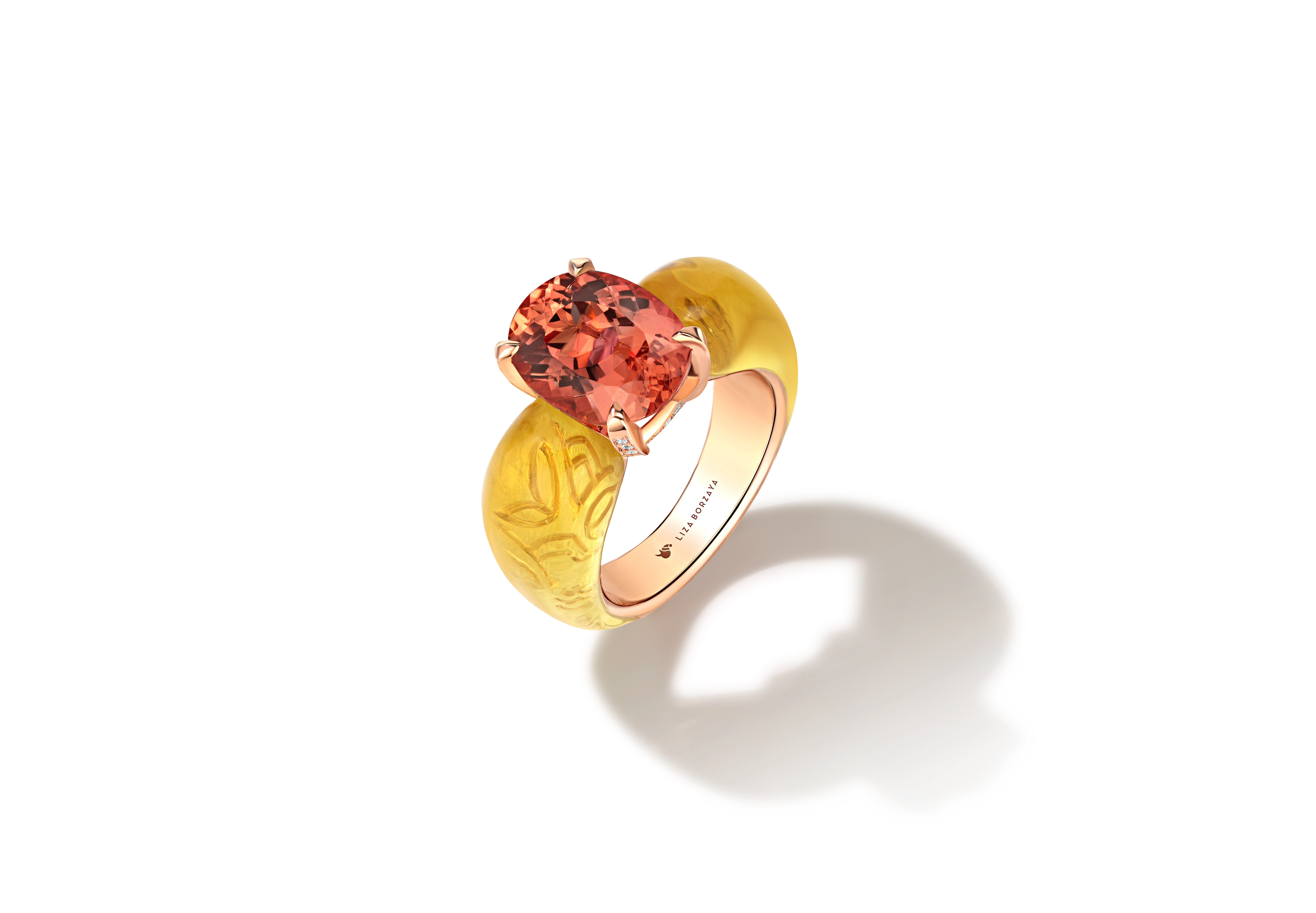 Ring with imperial topaz and amber